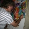 Curtis paints at the Jam Draw